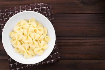 Fresh cooked farfalle, bow-tie or butterfly pasta served in bowl without sauce, photographed with...