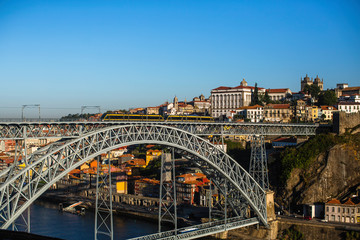 Fototapeta na wymiar View of the Bridge Dom Luis I and Douro river in Porto, Portugal.