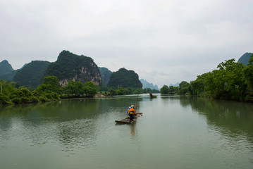 Bamboo boat floating on Li River Yangshuo