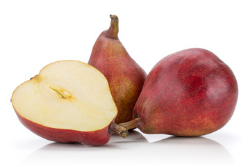 Group of two whole one half of fresh dark red pear anjou isolated on white background