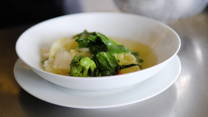 vegetable soup cap cay in bowl. traditional Asian soup cap cay