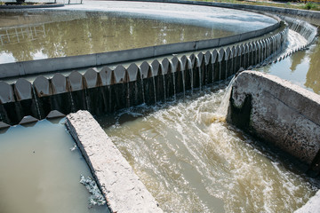 Round tank in wastewater treatment plant, close up