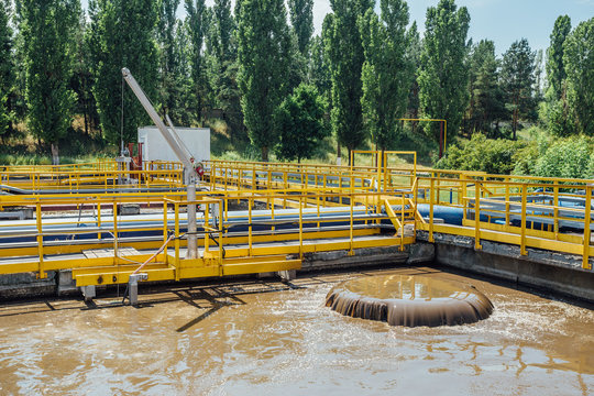 Modern wastewater treatment plant. Active sludge feeding into tanks for aeration and biological bacterial purification of sewage