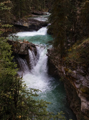 Naklejka premium waterfall in banff national park canada with very blue water