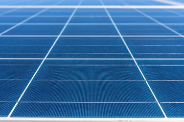 Solar Energy solar cell connections, silicon and encapsulant a nice technology blue pattern. Perspective view of the Poly crystalline silicon Solar Cells around the Solar Panel. Nice textured pattern