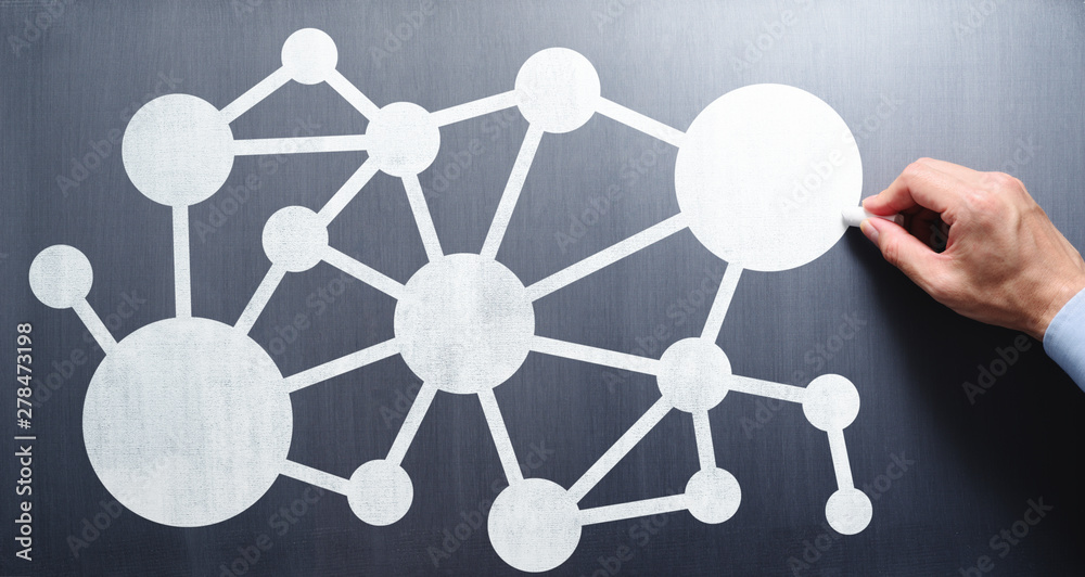 Poster network communication concept. businessman drawing network structure on chalkboard.