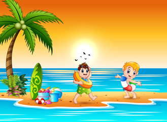 Obraz na płótnie Canvas Boys swimming with lifebuoy in the beach