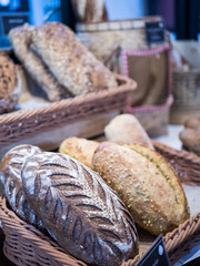 Close-up of french buns in the wood basket