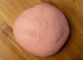 Japanese Snack - Pink Melon Pan on a wooden plate
