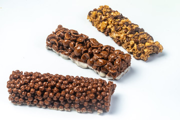 Three Varieties of Chocolate Breakfast Bar on white background. Shallow Depth of field