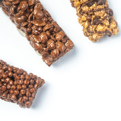 Three Varieties of Chocolate Breakfast Bar on white background. Shallow Depth of field