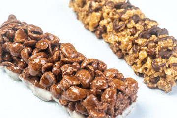 Three Varieties of Chocolate Breakfast Bar on white background. Shallow Depth of field