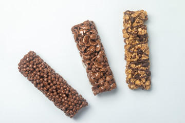 Three Varieties of Chocolate Breakfast Bar on white background. Shallow Depth of field