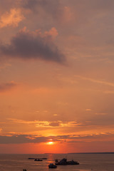 industrial ships at sunset