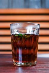 black tea with mint a wooden table