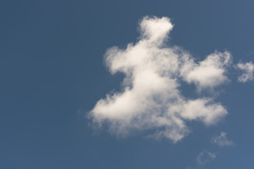 field and blue sky white clouds