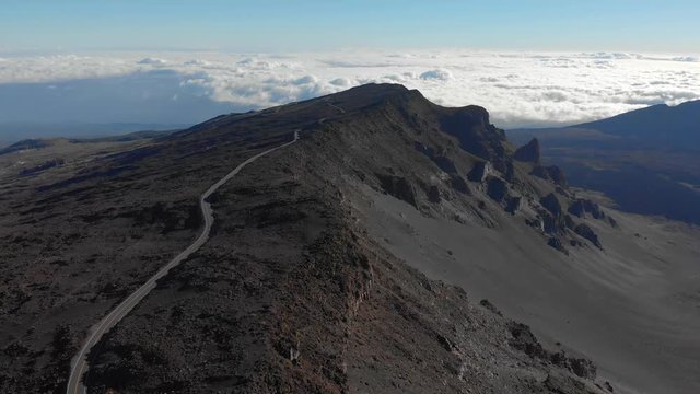 Version three, Drone going Backwards. Aerial Reveal of Main Road in Haleakala National Park.