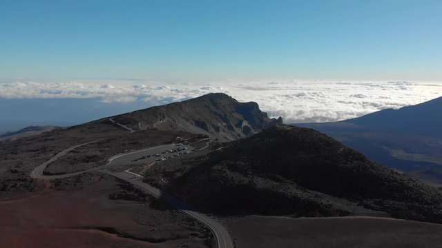 Aerial Tilt Down Shot over Haleakala National Park flying into Volcano Crater.
