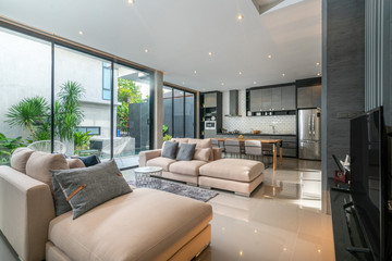 interior home design in living room with open kitchen in the loft house