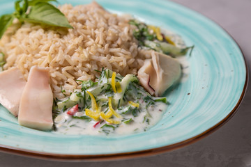 Squid with brown rice and cucumber in yogurt dressing