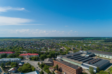 Rezh city and factory. Russia, Sverdlovsk region. Summer, sunny. Aerial