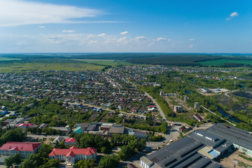 Rezh city and factory. Russia, Sverdlovsk region. Summer, sunny. Aerial
