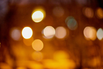 Abstract texture with light bokeh and black background