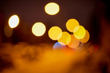 Abstract texture with light bokeh and black background