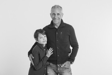 Dad holds the baby in his arms. The concept of educating the father of young children, Happy childhood, a friendly family.