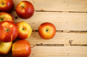 Red apples in wooden box
