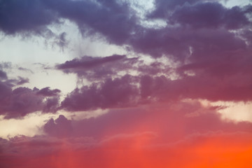 Obraz premium red clouds in the sky during a beautiful sunset