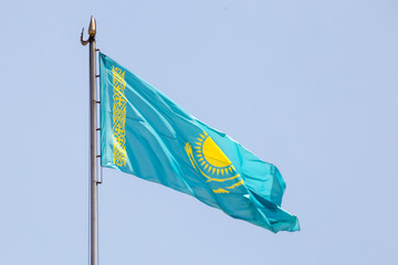 Flag of Kazakhstan against the background of the sky