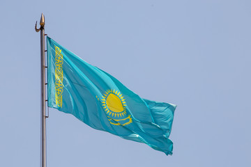 Flag of Kazakhstan against the background of the sky
