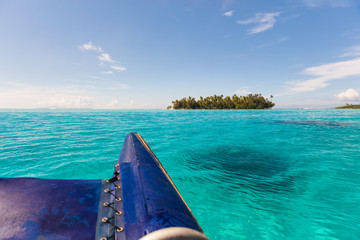 Boat excursion on catamaran going to private island in Bora Bora, Tahiti, French Polynesia.