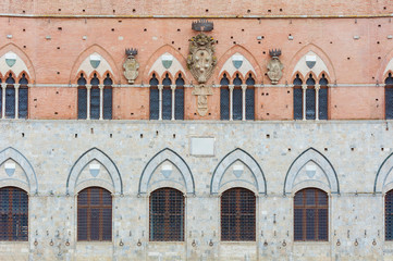 Obraz premium Exterior of Torre del Mangia in Piazza del Campo, Siena, Tuscany, Italy