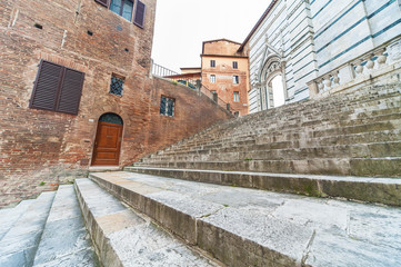 Stairway in historical city Siena, Tuscany, Italy
