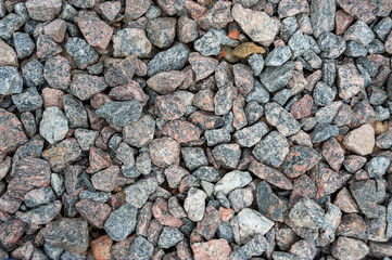 photo background of small eamens of granite and pebbles