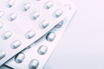 Packs of pills isolated on white background