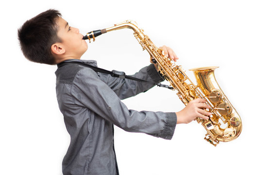 Little Asian Musician Boy Playing Saxophone Instrument