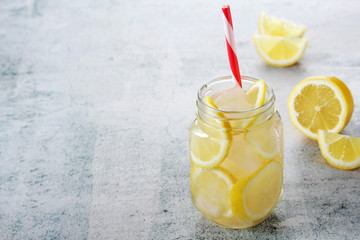 Lemonade with slices of lemon and ice