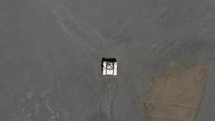 Drone, aerial footage of rover in quarry similar to mars or moon