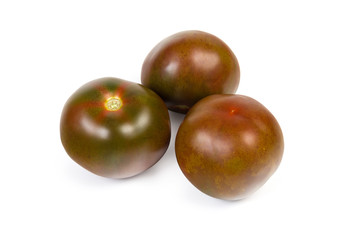 Ripe tomatoes kumato on a white background