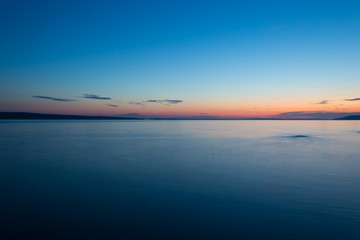 Sea and sky with clouds at sunset.