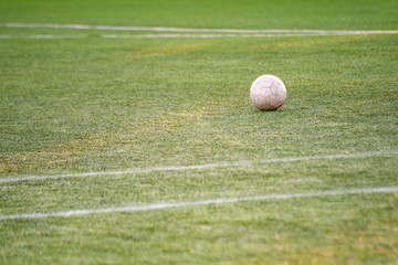 football soccer ball on the field of grass