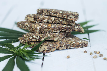 cannabis cookies and green leaves