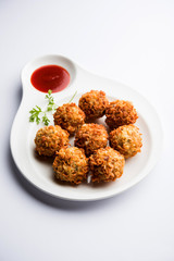 Crispy Noodles/maggie Pakora or pakoda is a popular indochinese street food served with ketchup