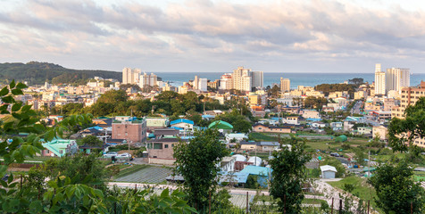 Obraz premium Panoramic view on Skyline and coastline of Seosaeng. Ulju County, Ulsan, South Korea, Asia.
