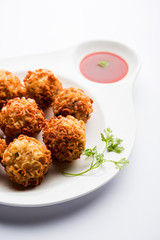 Crispy Noodles/maggie Pakora or pakoda is a popular indochinese street food served with ketchup