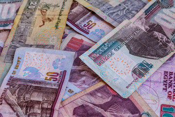 Heap of the different egyptian banknotes for background
