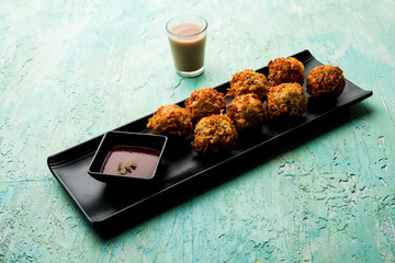 Crispy Noodles/maggie Pakora or pakoda is a popular indochinese street food served with ketchup